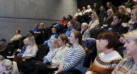 Hópur af fólki á viðburði Loftslagsleiðtogans